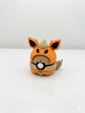 Toy figure of a fox-like character with a white background, canada, 3d printed, pokemon, flareon, poncho